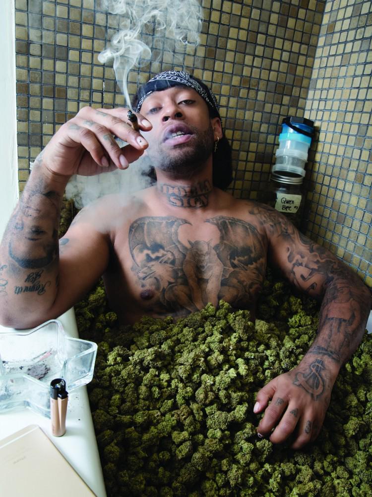Ty Dolla Sign smoking a cigarette (or weed)
