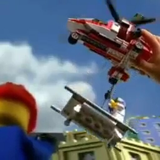 A rescue helicopter has fallen online into the man in lego city